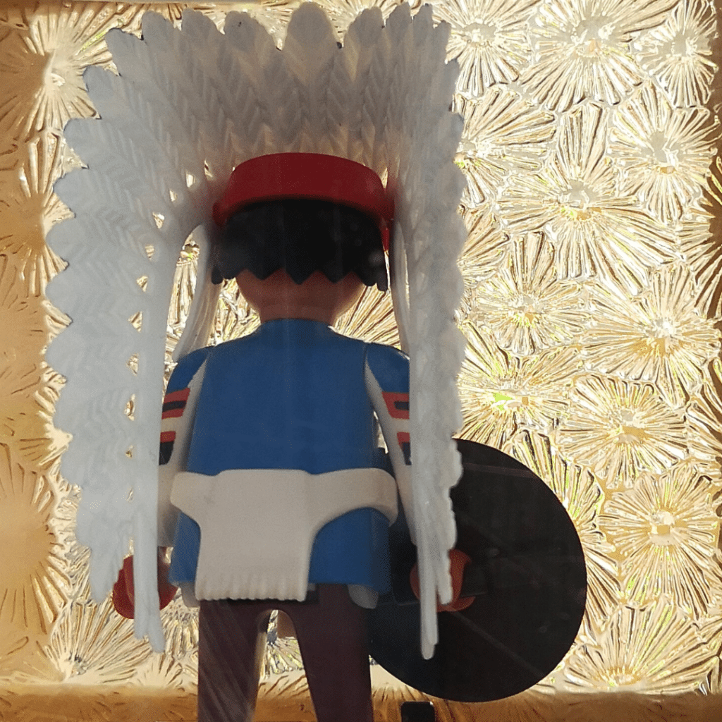 playmobil de dos placé derrière un verre imprimé